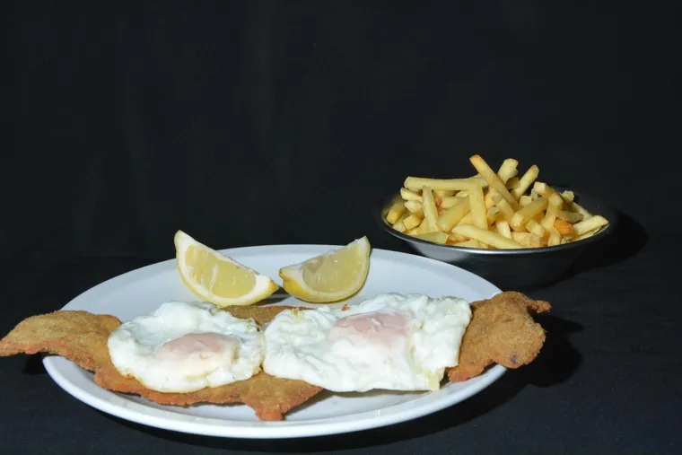 Milanesa a caballo de Pizzería Modini, Chacabuco